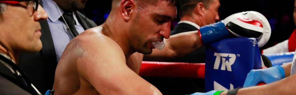 ‘I can’t go out like that’: Amir Khan vows to fight on after defeat to Terence Crawford