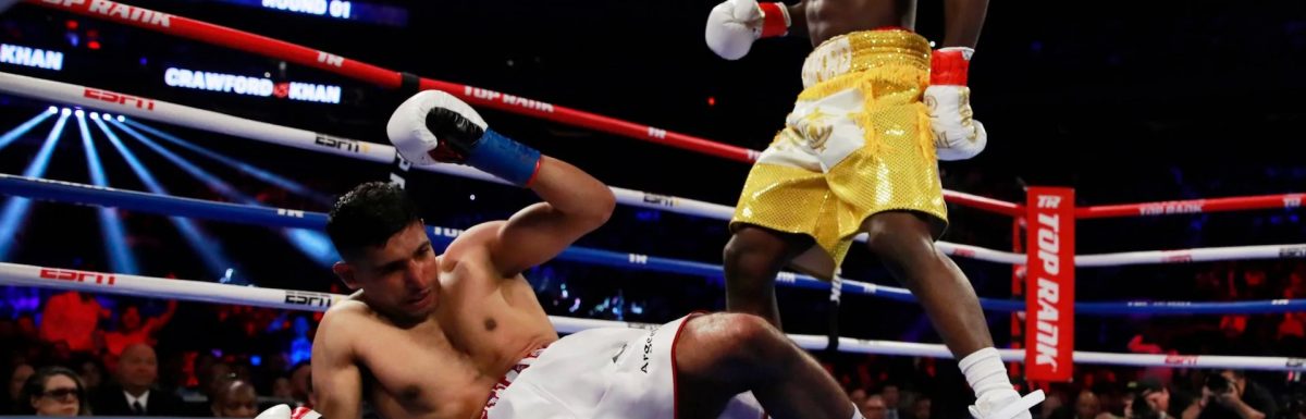 Terence Crawford dominates Amir Khan before farcical low-blow ending