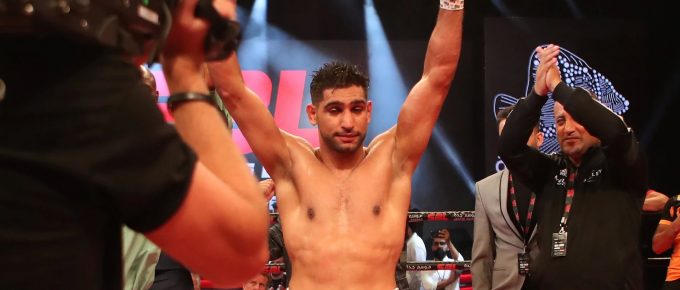 Amir Khan targets Manny Pacquiao after stopping Australian welterweight Billy Dib in Saudi Arabia