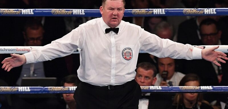 Boxing judge caught looking at phone during fight called before the stewards